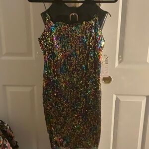 Black sequence dress, gold zippers, gold in the sequence with multicolors,